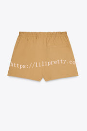 Chic Comfort Mid Rise Elastic Waist Contrast Buttons Pocket Mini Skort